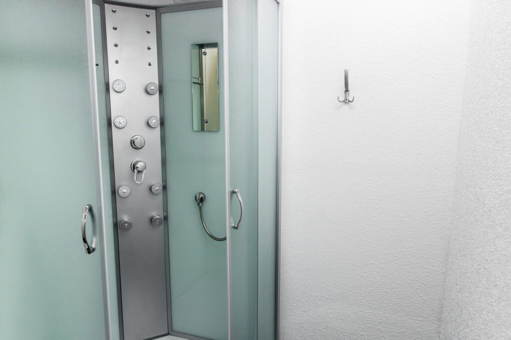 Shower room with cabin and lockers in physiotherapy rehab clinic